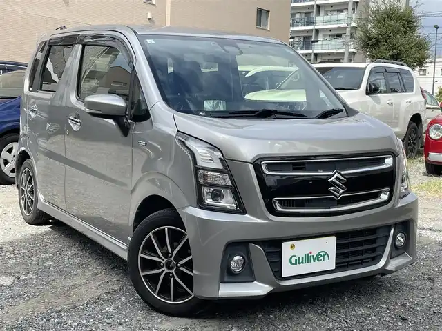 スズキ ワゴンＲ スティングレー HYBRID X 東京都 2017(平29)年 6.4万km スチールシルバーM 純正ナビ(CN-RZ82)/(DVD/フルセグ/Bluetooth/HDMI)/バックカメラ/ETC/シートヒーター(D席)/スズキセーフティサポート/・デュアルカメラブレーキサポート/・誤発進抑制機能(前方)/・車線逸脱警報機能/・ふらつき警報機能/・先行車発進お知らせ機能/ヘッドアップディスプレイ/LEDヘッドライト/スマートキー/スペアキー1本/保証書/取扱説明書