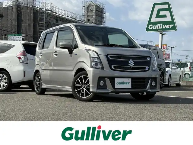 スズキ ワゴンＲ スティングレー HYBRID X 大分県 2017(平29)年 6.4万km スチールシルバーM 純正ナビ(CN-RZ82)/(DVD/フルセグ/Bluetooth/HDMI)/バックカメラ/ETC/シートヒーター(D席)/スズキセーフティサポート/・デュアルカメラブレーキサポート/・誤発進抑制機能(前方)/・車線逸脱警報機能/・ふらつき警報機能/・先行車発進お知らせ機能/ヘッドアップディスプレイ/LEDヘッドライト/スマートキー/スペアキー1本/保証書/取扱説明書