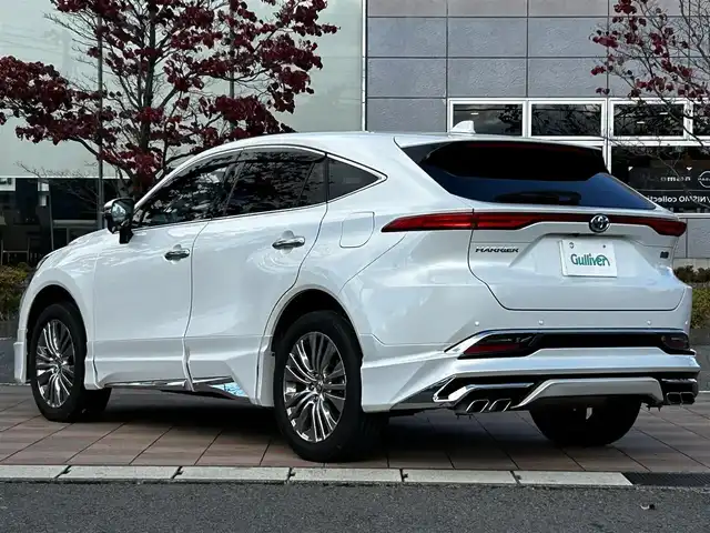 トヨタ ハリアー ハイブリッド Z レザーパッケージ 福島県 2023(令5)年 2.2万km プラチナホワイトパールマイカ トヨタセーフティセンス/プリクラッシュセーフティ/レーントレーシングアシスト/レーダークルーズコントロール/レーンディパーチャーアラート/オートマチックハイビーム/ロードサインアシスト/ドライバー異常時対応システム/プロアクティブドライビングアシスト /モデリスタエアロ/純正ディスプレイオーディオ/【USB/BT/TV/Miracast/ナビ機能】/バックカメラ/ビルトインETC/デジタルインナーミラー/ブラインドスポットモニター/ヘッドアップディスプレイ/ステアリングヒーター/前席シートヒーター/前席ベンチレーション/前席パワーシート/パワーバックドア/LEDオートライト/LEDフォグランプ/純正フロアマット/純正ドアバイザー