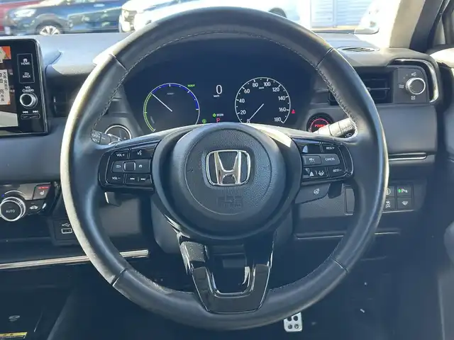 ホンダ ヴェゼル ハイブリッド e:HEV Z 群馬県 2021(令3)年 5.9万km プラチナホワイトパール ワンオーナー/ホンダセンシング/衝突軽減ブレーキ/純正メモリーナビ/バックカメラ　Bluetooth フルセグＴＶ/アダプティブクルーズコントロール/ヒルディセントコントロールスイッチ/両前席シートヒーター/パワーバックドア/パドルシフト/ステアリングヒーター/ステアリングリモコン/ビルトインＥＴＣ２．０/ブラインドスポットインフォメーション/ワイヤレススマホ充電/チップアップシート/社外ドライブレコーダー（前後カメラ）/保証書/取説/スペアキーｘ１