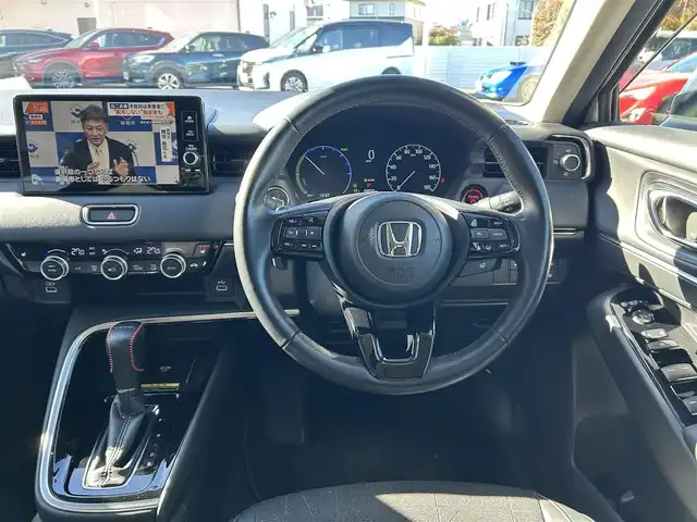 ホンダ ヴェゼル ハイブリッド e:HEV Z 群馬県 2021(令3)年 5.9万km プラチナホワイトパール ワンオーナー/ホンダセンシング/衝突軽減ブレーキ/純正メモリーナビ/バックカメラ　Bluetooth フルセグＴＶ/アダプティブクルーズコントロール/ヒルディセントコントロールスイッチ/両前席シートヒーター/パワーバックドア/パドルシフト/ステアリングヒーター/ステアリングリモコン/ビルトインＥＴＣ２．０/ブラインドスポットインフォメーション/ワイヤレススマホ充電/チップアップシート/社外ドライブレコーダー（前後カメラ）/保証書/取説/スペアキーｘ１