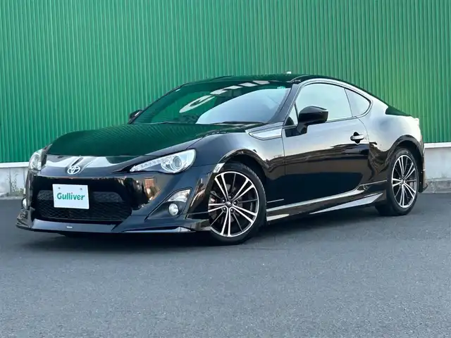トヨタ ８６ GT 宮城県 2014(平26)年 7.4万km クリスタルブラックシリカ モデリスタエアロ（F/S/R）/社外ナビ（DPV-7000）/・CD/DVD/・Bluetooth/・フルセグTV/バックモニター/ETC/革巻きステアリング/クルーズコントロール/HIDヘッドライト/フォグランプ/オートライト/スマートキー＆プッシュスタート/電動格納ミラー/純正17インチAW/純正フロアマット/純正ラゲッジマット/W/サイド/カーテンエアバッグ