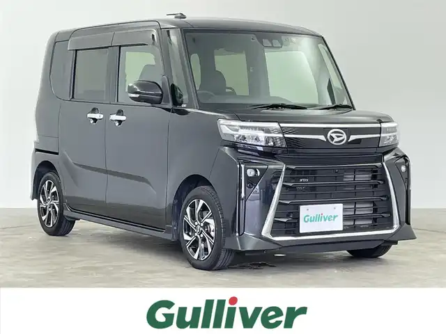 ダイハツ タント カスタム X 千葉県 2022(令4)年 1.8万km ブラックマイカメタリック 禁煙車/両側パワースライドドア/・ウェルカムオープン機能/・タッチ＆ゴーロック機能/スマートアシストIII/・衝突警報機能/衝突回避支援ブレーキ機能（対車両・対歩行者）/・車線逸脱警報機能/・誤発進抑制制御機能（前方、後方）/・オートハイビーム/・先行車発進お知らせ機能/・コーナーセンサー/純正SDナビ/・型式：NMZK-W72D/・CD/DVD/フルセグTV/Bluetooth/パノラマモニター/バックカメラ/シートヒーター/ETC/電動パーキングブレーキ/オートブレーキホールド機能/360°スーパーUV＆IRカットガラス/格納式リアドアサンシェード/アイドリングストップ/純正アルミホイール/純正フロアマット/LEDオートライト/LEDフォグランプ/プッシュスタート/スマートキー/スペアキー1本
