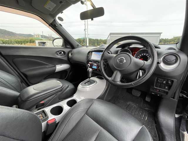 日産 ジューク 16GT プレミアムホワイトP 岡山県 2012(平24)年 11.4万km サファイアブラック 禁煙車/登録時走行距離：114016km/特別仕様車/純正SDナビ（型番：MC312D-W）/フルセグTV/Bluetooth/ビルトインETC/シートヒーター（D・N席）/レザーシート/オートリトラミラー/電動格納ミラー/オートライト/ヘッドライトレベライザー/ハロゲンヘッドライト/フォグライト/純正17インチAW/革巻きステアリング/プッシュスタート/スマートキー/ドアバイザー/純正フロアマット