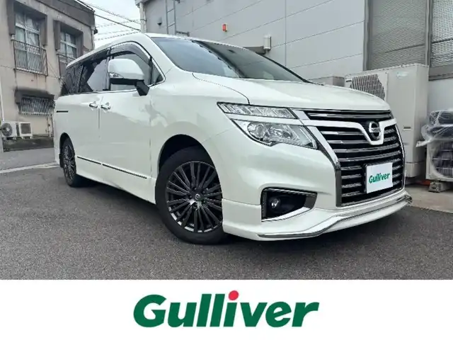 日産 エルグランド 250HWS S アーバンクロム 愛知県 2017(平29)年 3.6万km ブリリアントホワイトパール ワンオーナー/サンルーフ/純正9インチナビ（MM517D-L）/　CD/DVD/BD/SD/BT/USB/フルセグTV/バックカメラ/純正フリップダウンモニター/両側電動スライドドア/ナビ連動型ドライブレコーダー/ETC/クルーズコントロール/ハーフレザーシート/オットマンシート/リアサンシェード/ドアバイザー/純正フロアマット