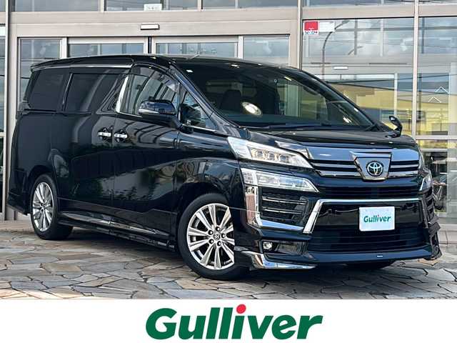 トヨタ ヴェルファイア Z ゴールデンアイズ 静岡県 2021(令3)年 2万km ブラック 純正ナビ/・AM/FM/・CD/DVD/・USB/・Bluetooth/・Miracast/セーフティセンス/プリクラッシュセーフティ/（ミリ波レーダー・単眼カメラ・昼自転車運転者＆夜間歩行者検知機能付）/（対車両：自車車速域約10km/hから最高速度：最大約40km/h減速可）/（対歩行者：自車車速域約10km/hから80km/h間：最大約30km/h減速可）/レーダークルーズコントロール（全車速追従機能付/ブレーキ制御付）/レーントレーシングアシスト（LTA）（作動車速：50km/h以上時）（ステアリング操作支援）/ロードサインアシスト（RSA）（道路標識認識支援）/オートマチックハイビーム/主要装備/・前後ドラレコ/・デジタルインナーミラー/・後席フリップダウンモニター/・ＥＴＣ/・オートハイビーム/・クリアランスソナー/・ＭＴモード付ＡＴ/・ＡＣ１００Ｖ電源/・モデリスタエアロ/・両側パワスラ/・電動パーキング/・ブラインドスポットモニター/・クリアランスソナー
