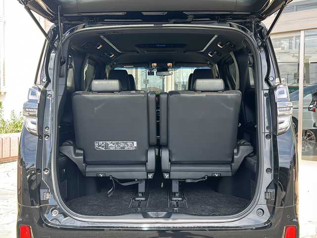 トヨタ ヴェルファイア Z ゴールデンアイズ 静岡県 2021(令3)年 2万km ブラック 純正ナビ/・AM/FM/・CD/DVD/・USB/・Bluetooth/・Miracast/セーフティセンス/プリクラッシュセーフティ/（ミリ波レーダー・単眼カメラ・昼自転車運転者＆夜間歩行者検知機能付）/（対車両：自車車速域約10km/hから最高速度：最大約40km/h減速可）/（対歩行者：自車車速域約10km/hから80km/h間：最大約30km/h減速可）/レーダークルーズコントロール（全車速追従機能付/ブレーキ制御付）/レーントレーシングアシスト（LTA）（作動車速：50km/h以上時）（ステアリング操作支援）/ロードサインアシスト（RSA）（道路標識認識支援）/オートマチックハイビーム/主要装備/・前後ドラレコ/・デジタルインナーミラー/・後席フリップダウンモニター/・ＥＴＣ/・オートハイビーム/・クリアランスソナー/・ＭＴモード付ＡＴ/・ＡＣ１００Ｖ電源/・モデリスタエアロ/・両側パワスラ/・電動パーキング/・ブラインドスポットモニター/・クリアランスソナー