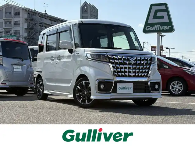 スズキ スペーシア カスタム HYBRID XS 大分県 2022(令4)年 1.2万km ピュアホワイトP ・純正ナビ(CD/DVD/SD/BT/USB)/・全方位カメラ/・フルセグテレビ/・衝突軽減ブレーキ/・コーナーセンサー/・両側パワースライド/・ヘッドアップディスプレイ/・レーダークルーズコントロール/・ETC/・ドライブレコーダー/・運転席シートヒーター/・スマートキー/・プッシュスタートボタン/・純正アルミホイール