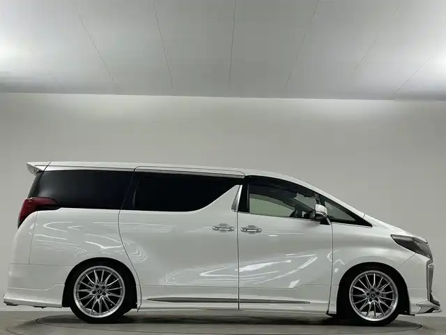 トヨタ アルファード S タイプゴールドⅡ 埼玉県 2021(令3)年 1.8万km ホワイトパールクリスタルシャイン 禁煙車　純正9型ナビ　サンルーフ　後席モニター　モデリスタエアロ　バックカメラ　ETC　デジタルインナーミラー　オットマン　両側パワースライドドア　電動リアゲート　衝突被害軽減　コーナーセンサー