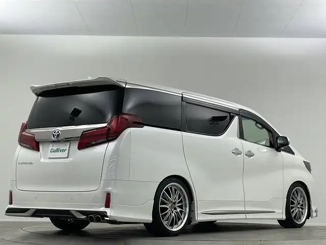 トヨタ アルファード S タイプゴールドⅡ 埼玉県 2021(令3)年 1.8万km ホワイトパールクリスタルシャイン 禁煙車　純正9型ナビ　サンルーフ　後席モニター　モデリスタエアロ　バックカメラ　ETC　デジタルインナーミラー　オットマン　両側パワースライドドア　電動リアゲート　衝突被害軽減　コーナーセンサー