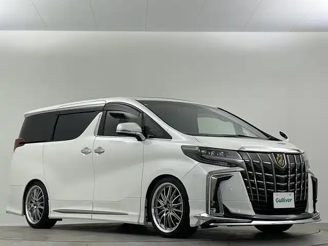 トヨタ アルファード S タイプゴールドⅡ 埼玉県 2021(令3)年 1.8万km ホワイトパールクリスタルシャイン 禁煙車　純正9型ナビ　サンルーフ　後席モニター　モデリスタエアロ　バックカメラ　ETC　デジタルインナーミラー　オットマン　両側パワースライドドア　電動リアゲート　衝突被害軽減　コーナーセンサー
