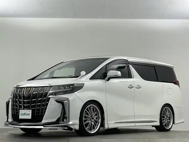 トヨタ アルファード S タイプゴールドⅡ 埼玉県 2021(令3)年 1.8万km ホワイトパールクリスタルシャイン 禁煙車　純正9型ナビ　サンルーフ　後席モニター　モデリスタエアロ　バックカメラ　ETC　デジタルインナーミラー　オットマン　両側パワースライドドア　電動リアゲート　衝突被害軽減　コーナーセンサー
