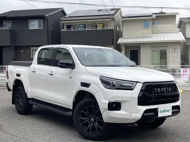 トヨタ ハイラックス Z GRスポーツ 兵庫県 2023(令5)年 0.7万km スーパーホワイトⅡ 純正ナビ/Bluetooth/FM/AM/USB/パノラミックビューモニター/ハードトノカバー/ETC/前後ドライブレコーダー/プリクラッシュセーフティ/レーンディパーチャーアラート/アダプティブクルーズコントロール/ロードサインアシスト/先行車発進告知/前後クリアランスソナー/ステアリングスイッチ/パドルシフト/LEDヘッドライト/フォグランプ/オートライト/ハーフレザーシート/D席 パワーシート/プッシュスタート/MTモード付きAT/パートタイム4WD/アイドリングストップ/横滑り防止装置/純正フロアマット/ISOFIX/新車時保証書/取扱説明書