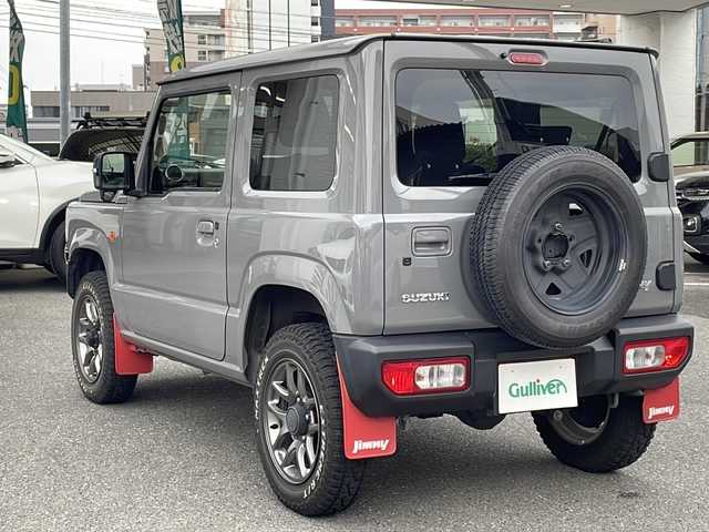 スズキ ジムニー XC 福岡県 2019(令1)年 7.1万km ミディアムグレー 前席シートヒーター　/クルーズコントロール　/ｔｙｐｅ－Ｃポート　/ＵＳＢポート　/純正ナビ（Ｂｌｕｅｔｏｏｔｈ・ラジオ・ＴＶ・ｉｐｏｄ）　/ＥＴＣ　/前方ドライブレコーダー　/背面タイヤ　/ＬＥＤライト/４WD/衝突軽減ブレーキ/フォグランプ/電動格納ミラー/ステアリングスイッチ/レーンキープアシスト/オートライト/純正ホイール/衝撃被害軽減システム/ダウンヒルアシストコントロール/レーンキープアシスト/取扱説明書