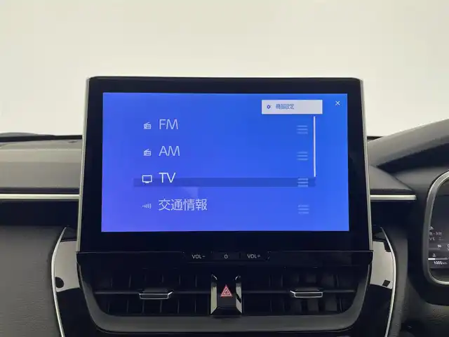 トヨタ カローラ クロス ハイブリッド Z 大分県 2024(令6)年 0.1万km プラチナホワイトパールマイカ トヨタセーフティセンス/・プリクラッシュセーフティ/・レーントレーシングアシスト/・オートマチックハイビーム/・レーダークルーズコントロール/純正ディスプレイオーディオ/（BT/フルセグTV/AppleCarPlay/パノラミックビューモニター/パノラマルーフ/パワーバックドア/LEDオートライト/フォグランプ/ハーフレザーシート/パワーシート/シートヒーター/純正18インチアルミホイール/クリアランスソナー/スマートキー/ETC2.0/保証書