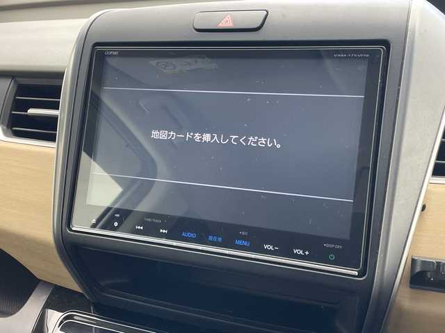 ホンダ フリード ハイブリット G ホンダセンシング 沖縄県 2016(平28)年 8.6万km ルナシルバーM 純正９インチナビ(VXM-175VFNI)　/(フルセグＴＶ　ＣＤ　ＤＶＤ　Bluetooth)　/フリップダウンモニター　/バックカメラ　/ＥＴＣ　/ドライブレコーダー前後　/ホンダセンシング/●衝突軽減ブレーキ〈CMBS〉/●誤発進抑制機能/●ACC〈アダプティブ・クルーズ・コントロール〉/●LKAS〈車線維持支援システム〉/●歩行者事故低減ステアリング/●路外逸脱抑制機能/●先行車発進お知らせ機能/●標識認識機能/両側パワースライドドア　/純正フロアマット　/ＬＥＤヘッドライト/オートヘッドライト/プッシュスタート/スマートキー/純正フロアマット/保証書/取扱説明書