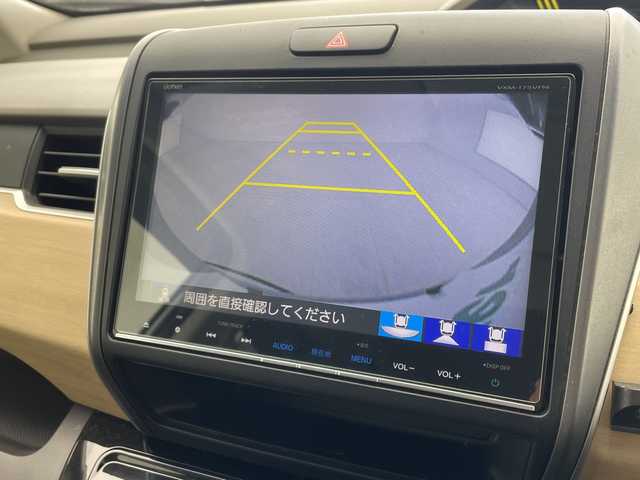 ホンダ フリード ハイブリット G ホンダセンシング 沖縄県 2016(平28)年 8.6万km ルナシルバーM 純正９インチナビ(VXM-175VFNI)　/(フルセグＴＶ　ＣＤ　ＤＶＤ　Bluetooth)　/フリップダウンモニター　/バックカメラ　/ＥＴＣ　/ドライブレコーダー前後　/ホンダセンシング/●衝突軽減ブレーキ〈CMBS〉/●誤発進抑制機能/●ACC〈アダプティブ・クルーズ・コントロール〉/●LKAS〈車線維持支援システム〉/●歩行者事故低減ステアリング/●路外逸脱抑制機能/●先行車発進お知らせ機能/●標識認識機能/両側パワースライドドア　/純正フロアマット　/ＬＥＤヘッドライト/オートヘッドライト/プッシュスタート/スマートキー/純正フロアマット/保証書/取扱説明書