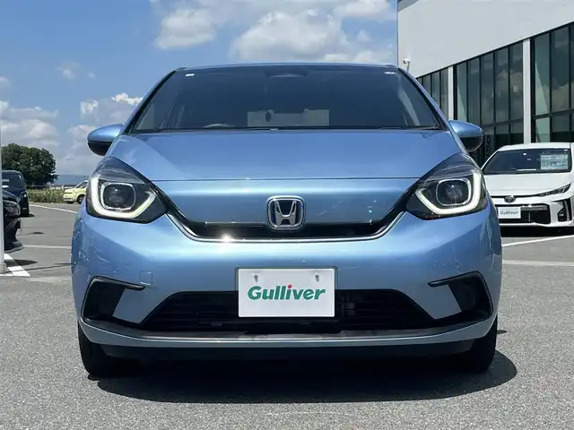 ホンダ フィット e:HEVホーム 奈良県 2020(令2)年 4.1万km ライトブルー ワンオーナー　/ホンダセンシング　/ｇａｔｈｅｒｓナビ(SDカードなし)/フルセグ/Bluetooth/バックカメラ　/ドラレコ前後　/ＥＴＣ２．０　/コーナーセンサー前後/アダプティブクルーズコントロール　/踏み間違い衝突軽減システム　/スマートキー　/LEDライト/レーンキープアシスト/カーテンエアバッグ