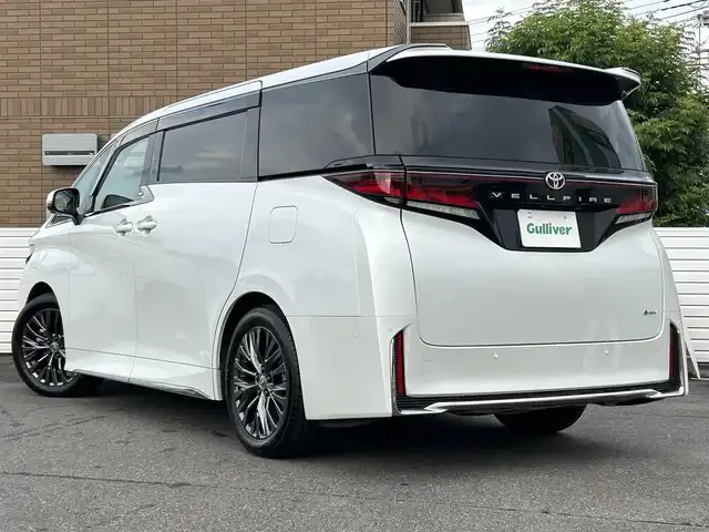 トヨタ ヴェルファイア ハイブリット Z プレミア 群馬県 2025(令7)年 0.8万km プラチナホワイトパールマイカ ワンオーナー/ガラスルーフ/純正メモリナビ/(BT/フルセグTV)/全周囲カメラ/後席フリップダウンモニター/追従機能付きクルーズコントロール/両側パワースライドドア/電動リアゲート/ETC2.0/盗難防止装置/オットマン/シートヒーター(D/Nセカンドシート)/ステアリングヒーター/プッシュスタート/スマートキー×２/保証書