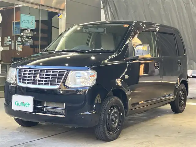 三菱 ｅＫワゴン M 東京都 2013(平25)年 1.7万km アメジストブラック F5ミッション/キーレスエントリー/Wエアバック/ドアバイザー/電動格納ミラー/走行16683km/メーカー保証書/点検整備記録簿/取扱説明書