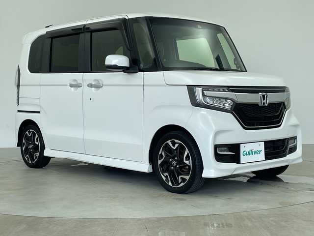 ホンダ Ｎ ＢＯＸ カスタム G EX ターボ ホンダセンシング 鹿児島県 2018(平30)年 6.4万km プラチナホワイトパール 純正ナビ/（CD/DVD/BT/フルセグTV）/両側パワースライドドア/アダプティブクルーズコントロール/衝突被害軽減ブレーキ/レーンキープアシスト/両側パワースライドドア/オートライト/オートマチックハイビーム/ハーフレザーシート/バックカメラ/スマートキー/プッシュスタート/リアサンシェード/パドルシフト/取説、保証書