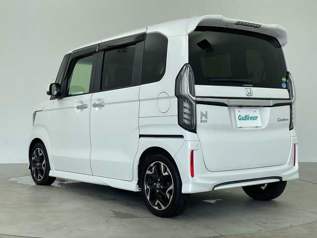 ホンダ Ｎ ＢＯＸ カスタム G EX ターボ ホンダセンシング 鹿児島県 2018(平30)年 6.4万km プラチナホワイトパール 純正ナビ/（CD/DVD/BT/フルセグTV）/両側パワースライドドア/アダプティブクルーズコントロール/衝突被害軽減ブレーキ/レーンキープアシスト/両側パワースライドドア/オートライト/オートマチックハイビーム/ハーフレザーシート/バックカメラ/スマートキー/プッシュスタート/リアサンシェード/パドルシフト/取説、保証書