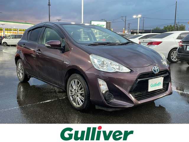 トヨタ アクア S 新潟県 2016(平28)年 10.2万km ディープアメジストマイカメタリック 純正HDDナビ/（BT／AM／FM〉/プッシュスタート/フルセグTV/バックカメラ/シートヒーター（運転席＋助手席）/オートライト/スペアキー/シガーソケット/ドアバイザー/電動格納自動ミラー/保証書/取り扱い説明書