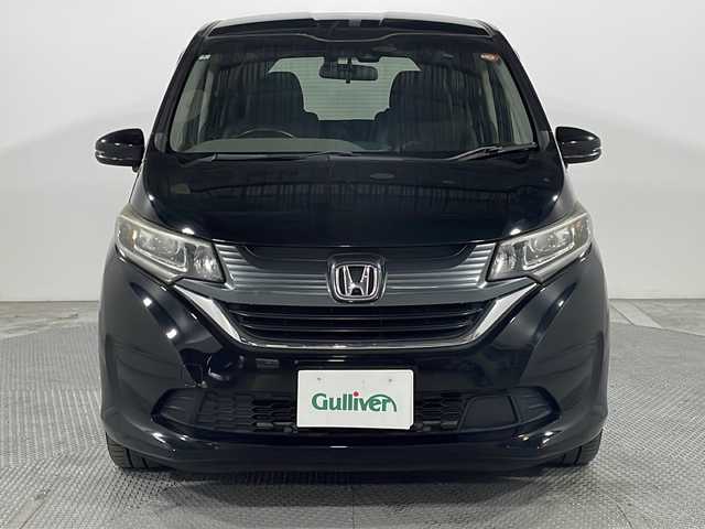 ホンダ フリード G ホンダセンシング 広島県 2017(平29)年 5.5万km クリスタルブラックパール 純正ナビ/後席フリップダウンモニター/バックカメラ/両側パワースライドドア/レーダークルーズコントロール/ＥＴＣ/ドラレコ/フルセグ/衝突軽減/レーンキープ/ＬＥＤヘッドライト/踏み間違い防止/オートライト/エアバッグ(運転席/助手席)/純正15インチアルミホイール(185/65/R15)