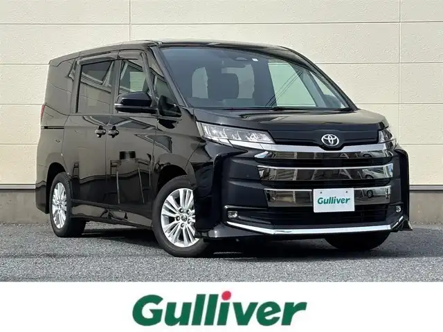 トヨタ ノア S－G 茨城県 2023(令5)年 2.6万km アティチュードブラックマイカ 純正メモリナビ(AM/FM/TV/Miracast/HDMI)/バックカメラ/クルーズコントロール/両側パワースライドドア/ビルトインETC2.0/LEDヘッドライト/フルセグTV/後席モニター/W(後席)エアコン/前後コーナーセンサー/レーンキープアシスト/オートライト/W+サイドエアバック/純正アルミホイール