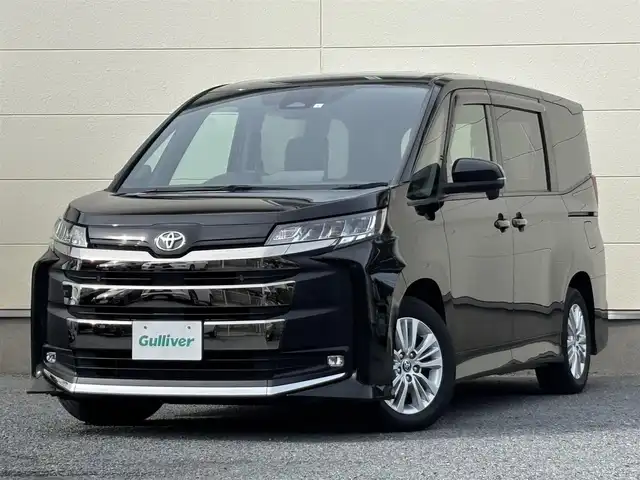 トヨタ ノア S－G 茨城県 2023(令5)年 2.6万km アティチュードブラックマイカ 純正メモリナビ(AM/FM/TV/Miracast/HDMI)/バックカメラ/クルーズコントロール/両側パワースライドドア/ビルトインETC2.0/LEDヘッドライト/フルセグTV/後席モニター/W(後席)エアコン/前後コーナーセンサー/レーンキープアシスト/オートライト/W+サイドエアバック/純正アルミホイール
