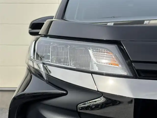 トヨタ ノア S－G 茨城県 2023(令5)年 2.6万km アティチュードブラックマイカ 純正メモリナビ(AM/FM/TV/Miracast/HDMI)/バックカメラ/クルーズコントロール/両側パワースライドドア/ビルトインETC2.0/LEDヘッドライト/フルセグTV/後席モニター/W(後席)エアコン/前後コーナーセンサー/レーンキープアシスト/オートライト/W+サイドエアバック/純正アルミホイール