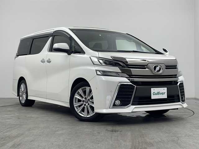 トヨタ ヴェルファイア Z Aエディション 三重県 2015(平27)年 8.4万km ホワイトパールクリスタルシャイン 禁煙車/純正ナビ/CD/DVD/SD/BT/フルセグTV/バックカメラ/ツインムーンルーフ/純正フリップダウンモニター/両側パワースライドドア/JBLプレミアムサウンド/クルーズコントロール/クリアランスソナー/ドライブレコーダー（前方）/電子パーキングブレーキ/ビルトインETC/オートブレーキホールド/AC100V/パーキングアシスト/革巻ステアリング