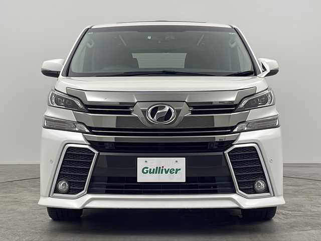 トヨタ ヴェルファイア Z Aエディション 三重県 2015(平27)年 8.4万km ホワイトパールクリスタルシャイン 禁煙車/純正ナビ/CD/DVD/SD/BT/フルセグTV/バックカメラ/ツインムーンルーフ/純正フリップダウンモニター/両側パワースライドドア/JBLプレミアムサウンド/クルーズコントロール/クリアランスソナー/ドライブレコーダー（前方）/電子パーキングブレーキ/ビルトインETC/オートブレーキホールド/AC100V/パーキングアシスト/革巻ステアリング