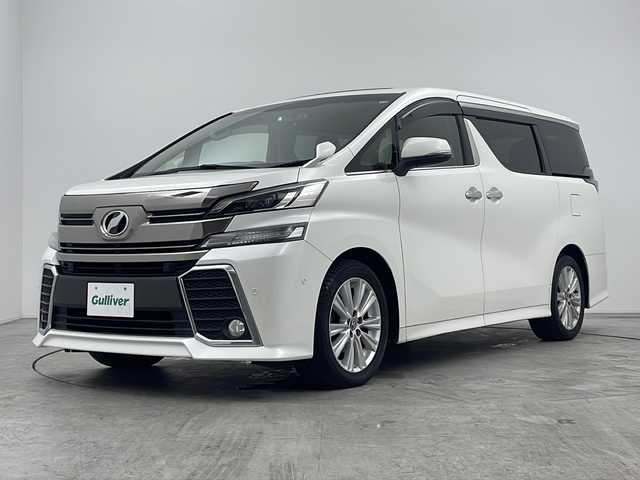 トヨタ ヴェルファイア Z Aエディション 三重県 2015(平27)年 8.4万km ホワイトパールクリスタルシャイン 禁煙車/純正ナビ/CD/DVD/SD/BT/フルセグTV/バックカメラ/ツインムーンルーフ/純正フリップダウンモニター/両側パワースライドドア/JBLプレミアムサウンド/クルーズコントロール/クリアランスソナー/ドライブレコーダー（前方）/電子パーキングブレーキ/ビルトインETC/オートブレーキホールド/AC100V/パーキングアシスト/革巻ステアリング