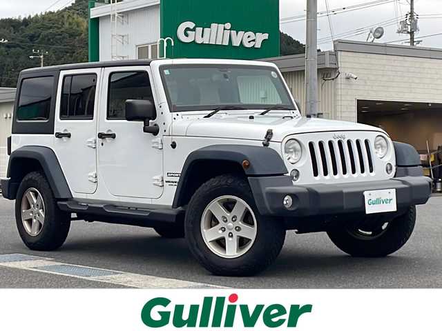 クライスラー・ジープ ジープ ラングラー アンリミテッド スポーツ 山口県 2016(平28)年 7.5万km 白 社外メモリナビ/Ｂｌｕｅｔｏｏｔｈ/フルセグＴＶ/ＨＩＤヘッドライト/リモコンキー/クルーズコントロール/ＥＴＣ/オートエアコン/横滑り防止装置/純正１７インチアルミホイール/背面タイヤ/サイドカメラ/ヒルディセントコントロール/保証書・取説/スペアキー1本