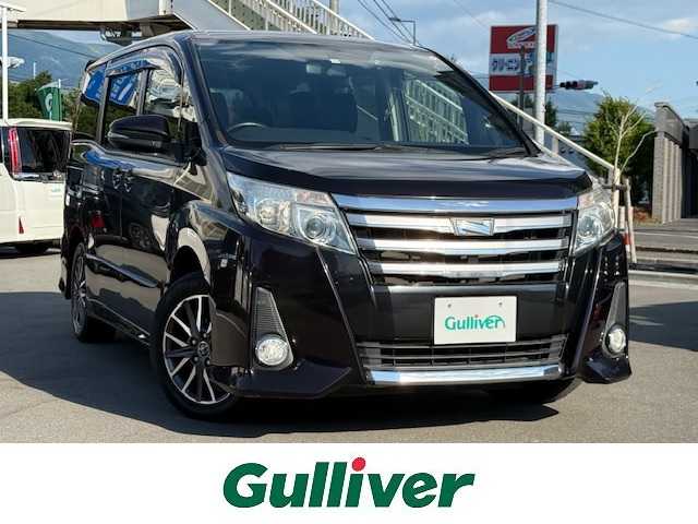 トヨタ ノア Si 長野県 2015(平27)年 5.6万km ボルドーマイカメタリック 純正ナビ/（FM/AM/BTフルセグ） /片側パワースライドドア /スマートキー /LEDヘッドライト /オートライト /バックカメラ /アイドリングストップ /プッシュスタート /横滑り防止装置 /純正フロアマット/純正アルミホイール/保証書・取扱説明書