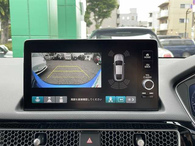 ホンダ シビック EX 東京都 2023(令5)年 0.8万km プレミアムクリスタルブルークリスタル ワンオーナー/新車時保証書/取扱説明書　ナビ説明書/ホンダセンシング/アダプティブクルーズコントロール/アイドリングストップ/純正ナビ/フルセグTV/USB/BT/Apple CarPlay/Android Auto/Boseプレミアムサウンドシステム/バックカメラ　ビルトインETC2.0/qi充電/純正ドライブレコーダー【前後】/プライムスムース×ウルトラスエードコンビシート/D/N席シートヒーター/スマートキー×2本/LEDヘッドライト/オートライト/LEDフォグライト/サイド/カーテン/ニーエアバック/革巻きハンドル・シフトノブ/純正18インチアルミ/純正テールゲートスポイラーウィングタイプ