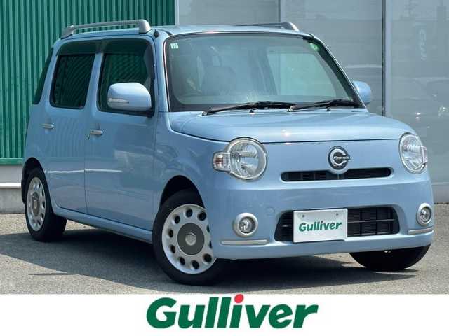 ダイハツ ミラ ココア プラスX 福岡県 2010(平22)年 9.6万km ミストブルーマイカメタリック 盗難防止装置/ベンチシート/純正フロアマット/BT接続/バックカメラ/AAC/ルーフレール/SDナビ/フルセグTV/ETC/CDチェンジャー