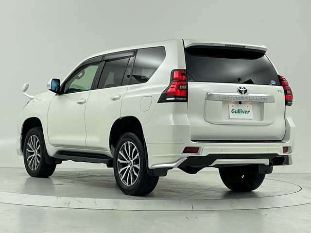 トヨタ ランドクルーザー プラド TX Lパッケージ 大阪府 2019(平31)年 4.4万km ホワイトパールクリスタルシャイン トヨタセーフティーセンス/　・プリクラッシュセーフティー/　・車線逸脱警報/　・レーダークルーズコントロール/　・オートマチックハイビーム/社外ディスプレイオーディオ/　CD/DVD/BT/バックカメラ/モデリスタエアロ/　フロント/リア/LEDヘッドライト/レザーシート/パワーシート/シートヒーター/エアシート/純正19インチアルミホイール/スマートキー/プッシュスタート/フォグランプ