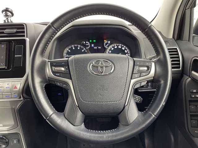 トヨタ ランドクルーザー プラド TX Lパッケージ 大阪府 2019(平31)年 4.4万km ホワイトパールクリスタルシャイン トヨタセーフティーセンス/　・プリクラッシュセーフティー/　・車線逸脱警報/　・レーダークルーズコントロール/　・オートマチックハイビーム/社外ディスプレイオーディオ/　CD/DVD/BT/バックカメラ/モデリスタエアロ/　フロント/リア/LEDヘッドライト/レザーシート/パワーシート/シートヒーター/エアシート/純正19インチアルミホイール/スマートキー/プッシュスタート/フォグランプ