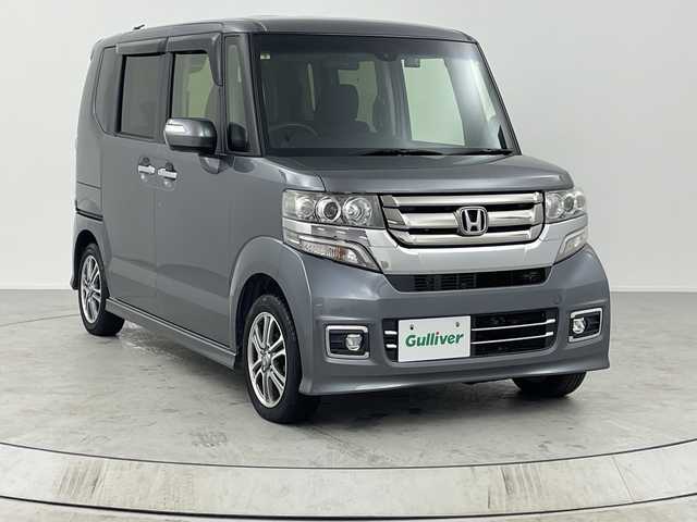 ホンダ Ｎ ＢＯＸ カスタム G SSパッケージ 熊本県 2016(平28)年 7.7万km シャイニンググレーM 純正7インチナビ（VXM-174VFXi）/フルセグTV/Bluetooth/バックカメラ/両側パワースライドドア/シティブレーキアクティブシステム/前席シートひたー/HIDヘッドライト/社外ドラレコ/ステアリングリモコン/スマートキー/プッシュスタート
