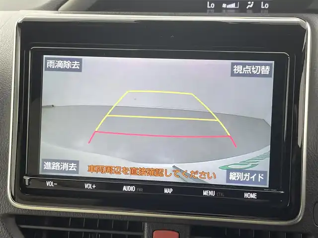 トヨタ ヴォクシー ハイブリッド ZS 煌 熊本県 2018(平30)年 6.4万km ホワイトパールクリスタルシャイン ワンオーナー/禁煙車/純正9インチメモリナビ【NSZT-Y68T】/フルセグTV・BT・CD・DVD・FM・AM/バックカメラ/ビルトインETC/クルーズコントロール/トヨタセーフティーセンス/・プリクラッシュセーフティ/・レーンディパーチャーアラート/・オートハイビーム/両側パワースライドドア/横滑り防止/純正LEDヘッドライト/革調シートカバー/前席シートヒーター/革巻きステアリング/ステアリングスイッチ/リアオートエアコン/純正16インチアルミホイール/スマートキー/プッシュスタート/スペアキー1本/保証書/取扱説明書