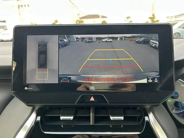 トヨタ ハリアー ハイブリッド Z レザーパッケージ 岡山県 2021(令3)年 9.7万km プレシャスブラックパール 登録時走行距離69650km/GRエアロ/JBLプレミアムサウンド/純正12.3インチナビ/フルセグTV(AM/FM/Bluetooth)/全方位カメラ/ビルトインETC2.0/デジタルインナーミラー/ヘッドアップディスプレイ/トヨタセーフティセンス/・ブラインドスポットモニター/・プリクラッシュセーフティ/・レーダークルーズコントロール/・レーンディバーチャーアラート/D/N席シートヒーター/D/N席ベンチレーション/ステアリングヒーター/クリアランスソナー/横滑り防止装置/アイドリングストップ/パワーバックドア/19インチ純正AW/フロアマット/本革シート/D+N席パワーシート/社外マフラー