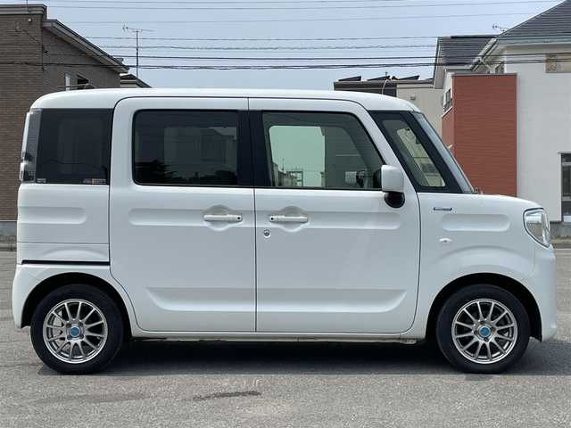 マツダ フレアワゴン ハイブリッド XS 道央・札幌 2018(平30)年 10.5万km ピュアホワイトP ４WD/社外メモリーナビ/AM/FM/BT/ワンセグ/衝突被害軽減ブレーキ/横滑り防止装置/レーンキープアシスト/リヤパーキングセンサー/ビルトインETC/ドライブレコーダー/アイドリングストップ/PWRMODE/両側パワースライドドア/前席シートヒーター/プッシュスタート/スマートキー/ハロゲンヘッドライト/オートライト/ヘッドライトレベライザー/電動格納ミラー/ヒーテッドドアミラー/純正フロアマット