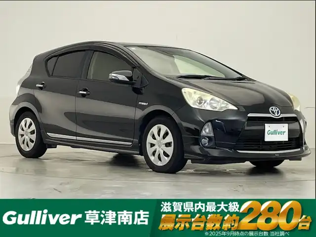 トヨタ アクア S 滋賀県 2012(平24)年 4.8万km ブラックマイカ 純正７インチナビ/【Bluetooth/CD/DVD/フルセグTV/SD】/モデリスタエアロ/ETC/D/Nシートヒーター/オートライト/純正フロアマット/プッシュスタート/ステアリングリモコン/スマートキー
