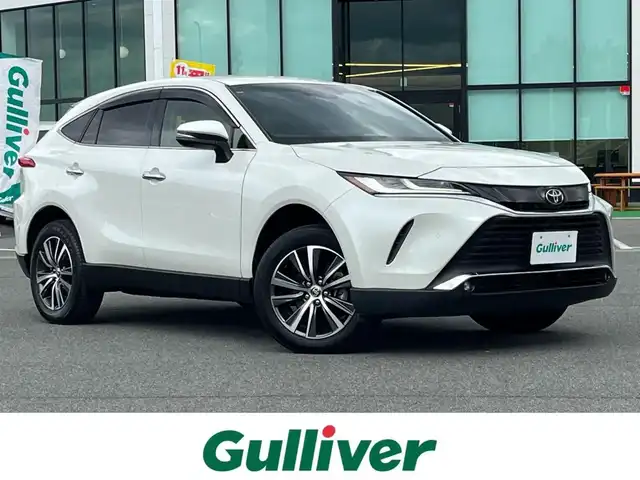 トヨタ ハリアー G 奈良県 2021(令3)年 1.6万km ホワイトパールクリスタルシャイン 純正８インチディスプレイオーディオ/（BT/AppleCarPlay/AndroidAuto）/レーダークルーズコントロール/バックカメラ/前後コーナーセンサー/プリクラッシュセーフティ/レーンキープアシスト/パワーバックドア/ハーフレザーシート/運転席パワーシート/前方ドライブレコーダー/ＥＴＣ２．０/純正18インチＡＷ/保証書/取り扱い説明書/スペアキーX1