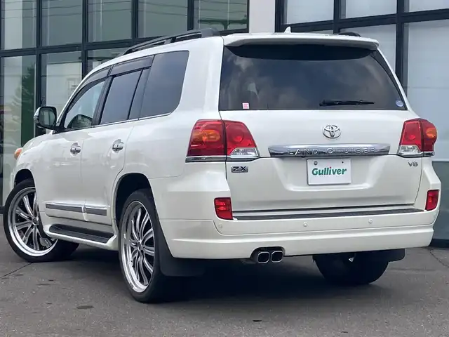 トヨタ ランドクルーザー ZX 道南・函館 2013(平25)年 12.1万km ホワイトパールクリスタルシャイン /純正ナビ//フルセグTV//バックカメラ//後席モニター//センターコンソールクーラーボックス//エンジンスターター//ETC//サンルーフ//パワーバックドア//電動格納サードシート//シートベンチレーション//シートヒーター//ステアリングヒーター//クルーズコントロール//クリアランスソナー//HIDヘッドライト//オートライト//スマートキー//エンジンプッシュスタート