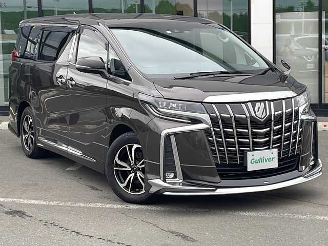 トヨタ アルファード S 道東・釧路十勝 2022(令4)年 6.9万km グラファイトM ・４WD/・モデリスタフルエアロ/・純正9インチディスプレイオーディオ/　（AM　FM　CD　DVD　BT　TV　Miracast）/・純正12.1型フリップダウンモニター/・純正デジタルインナーミラー/・純正ETC/・トヨタセーフティセンス/・プリクラッシュセーフティ/・レーントレーシングアシスト/・クリアランスソナー/・ブラインドスポットモニター/・ロードサインアシスト/・リヤクロストラフィックアラート/・レーダークルーズコントロール/・nanoe/・電格ミラー/・スマートキー/・プッシュスタート/・純正アルミホイール付夏タイヤ積込/　（235/50/R18 2022年製　６mm ）