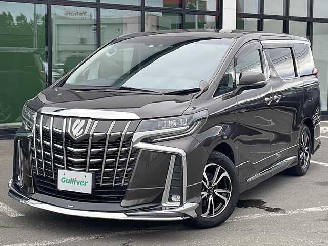 トヨタ アルファード S 道東・釧路十勝 2022(令4)年 6.9万km グラファイトM ・４WD/・モデリスタフルエアロ/・純正9インチディスプレイオーディオ/　（AM　FM　CD　DVD　BT　TV　Miracast）/・純正12.1型フリップダウンモニター/・純正デジタルインナーミラー/・純正ETC/・トヨタセーフティセンス/・プリクラッシュセーフティ/・レーントレーシングアシスト/・クリアランスソナー/・ブラインドスポットモニター/・ロードサインアシスト/・リヤクロストラフィックアラート/・レーダークルーズコントロール/・nanoe/・電格ミラー/・スマートキー/・プッシュスタート/・純正アルミホイール付夏タイヤ積込/　（235/50/R18 2022年製　６mm ）