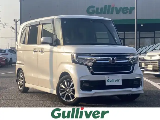 ホンダ Ｎ ＢＯＸ カスタム L 島根県 2022(令4)年 2.4万km プラチナホワイトパール ワンオーナー /ディーラーOPナビ(CD/DVD/BT/フルセグ)/レーダークルーズコントロール/衝突被害軽減ブレーキ/路外逸脱抑制/先行車発進お知らせ/レーンキープアシスト/純正フロアマット/両側パワースライドドア/ビルトインETC/前席シートヒーター /オートライト/前後ドライブレコーダー/社外AW付き冬タイヤ/取扱説明書/保証書/スペアキー×1